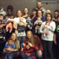 Delanie Walker posing with members of the community center